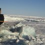 Looking forward along the side of Icebreaker Oden while breaking ice.  Ice of 3-4m thickness is being broken and the resulting pieces can be seen turned on their sides. (1991)