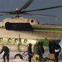 MI-8 helicopter transporting equipment. (Sakhalin Island, 1998)